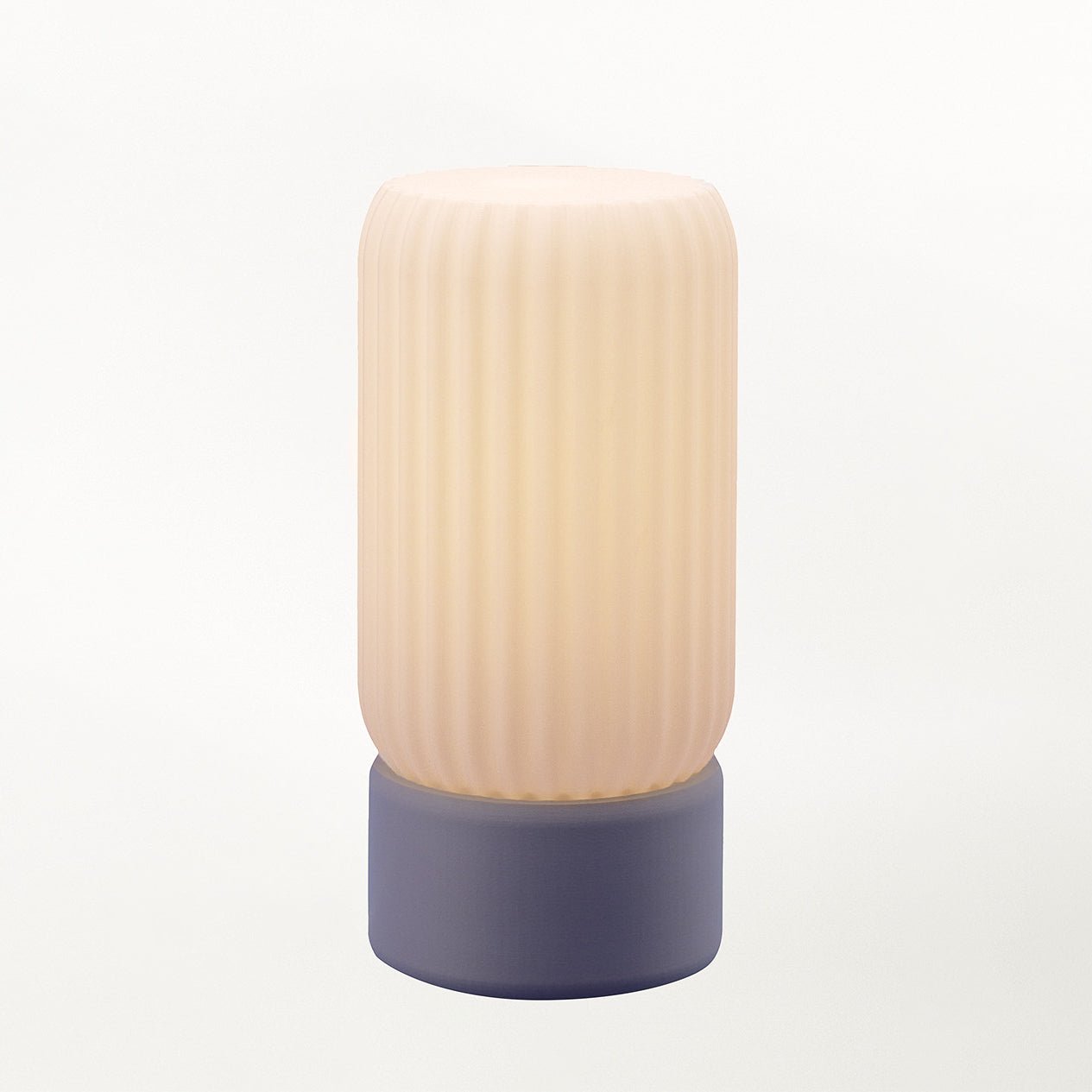 Terra Labs Milk Shade Barrel Table Lamp with frosted glass shade and sleek metal base on a wooden surface.
