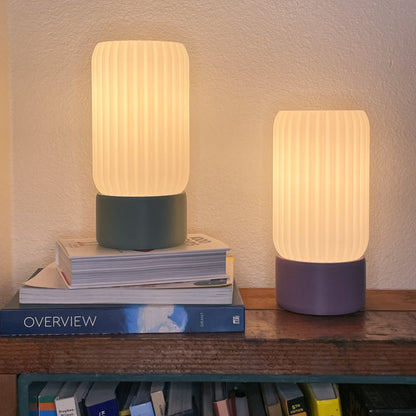 Terra Labs Milk Shade Barrel Table Lamp with a smooth milk-colored shade and sleek base, ideal for modern home decor.