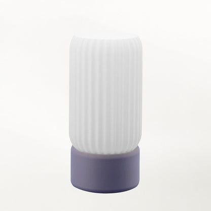 Terra Labs Milk Shade Barrel Table Lamp with a frosted glass shade and sleek metal base, ideal for modern home decor.