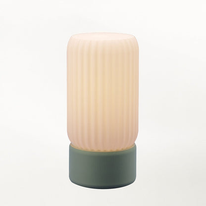 Terra Labs Milk Shade Barrel Table Lamp with a smooth, rounded milk-colored shade and sleek base, perfect for modern decor.