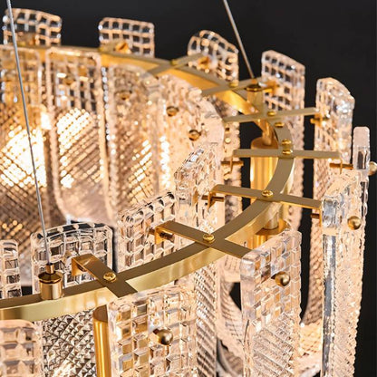 Mudil Round Chandelier by Residence Supply featuring a modern circular design with multiple hanging light fixtures.