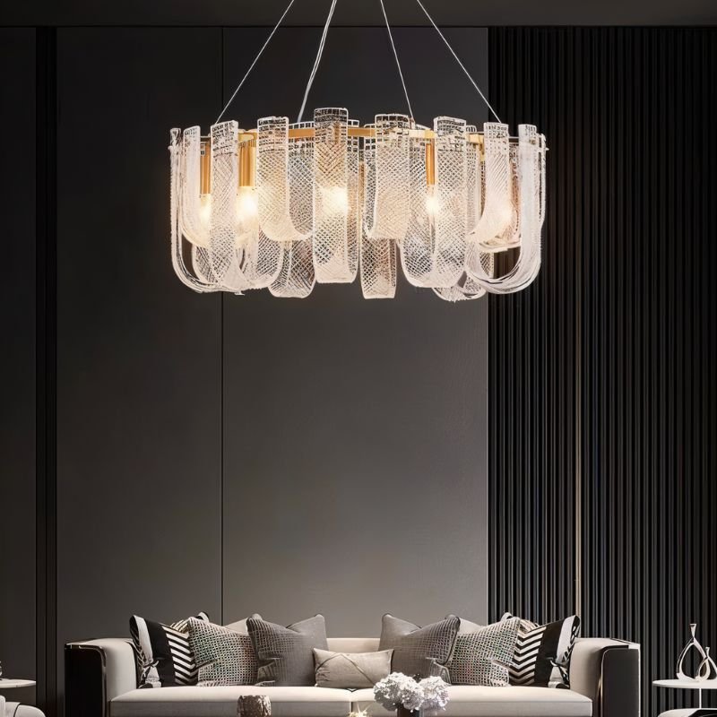 Elegant Mudil Round Chandelier by Residence Supply with a modern design featuring multiple hanging lights and a sleek metallic finish.