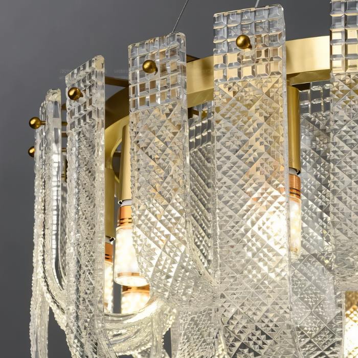 Mudil Round Chandelier by Residence Supply with metal frame and multiple light bulbs, hanging fixture for modern interior lighting.