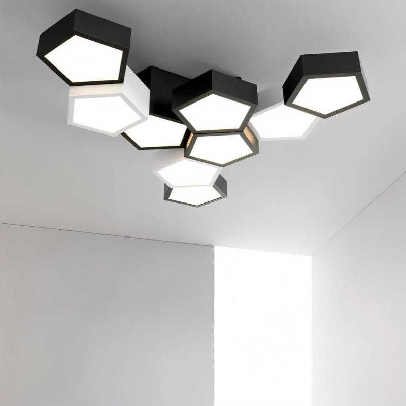 Modern Mukab Ceiling Light by Residence Supply with sleek design and warm illumination, mounted on a ceiling in a contemporary room.