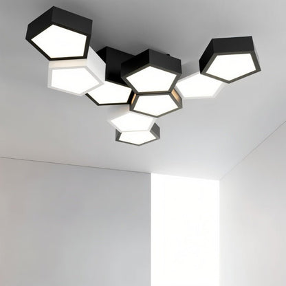 Modern Mukab Ceiling Light by Residence Supply with sleek design and warm illumination, mounted on a ceiling in a contemporary room.