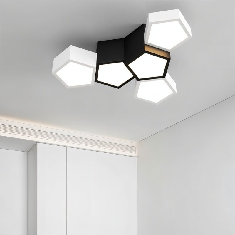 Mukab ceiling light fixture by Residence Supply, featuring a sleek modern design with a round, white frosted glass shade.