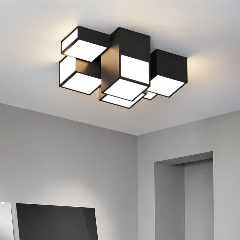 Residence Supply Mukab ceiling light fixture with modern design and warm lighting, mounted on a ceiling with a sleek finish.