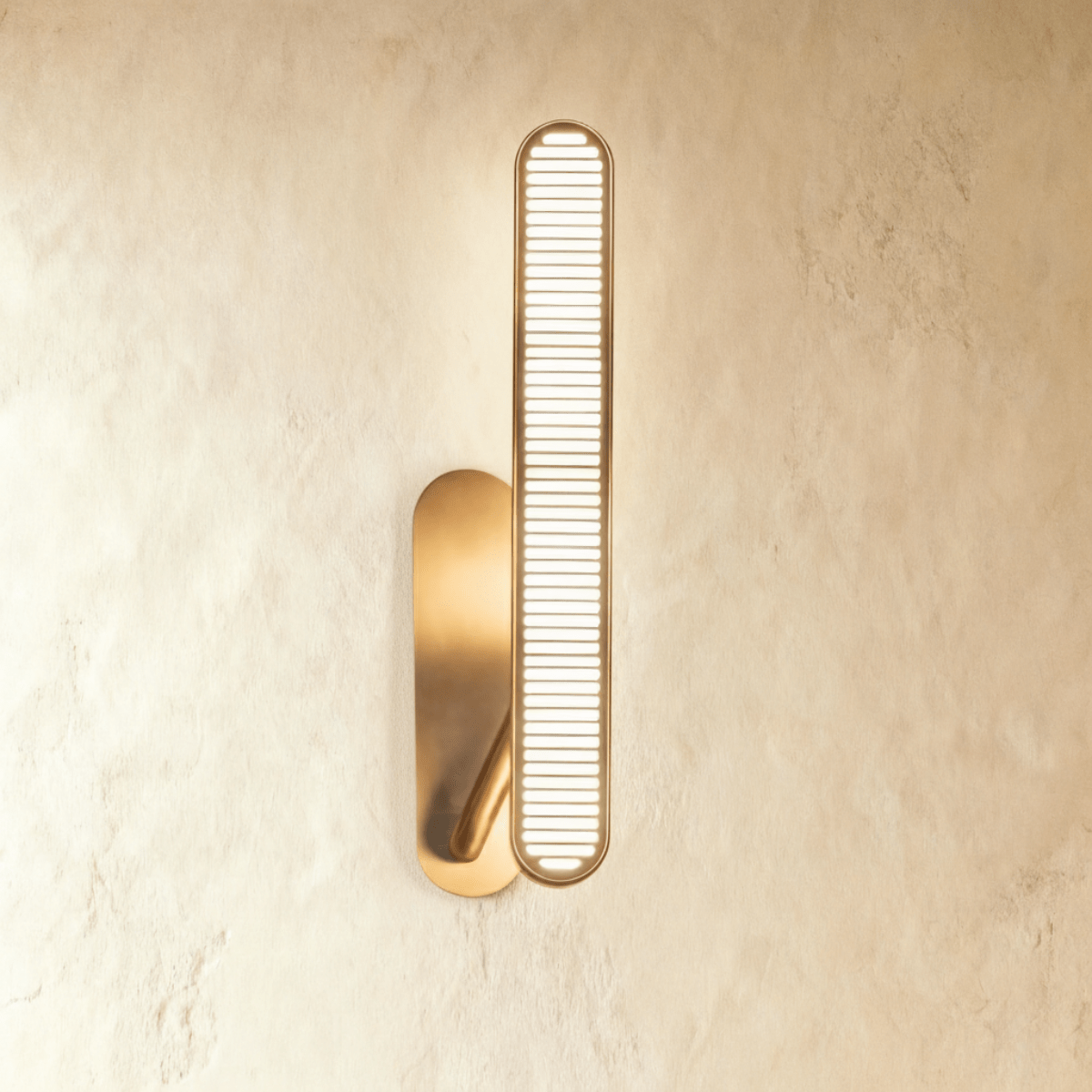 Modern Munira Wall Lamp by Residence Supply featuring a sleek, curved metal design and a warm LED light for stylish illumination.