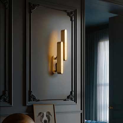 Munira Wall Lamp by Residence Supply, sleek modern wall-mounted light fixture with a minimalist design and warm illumination.
