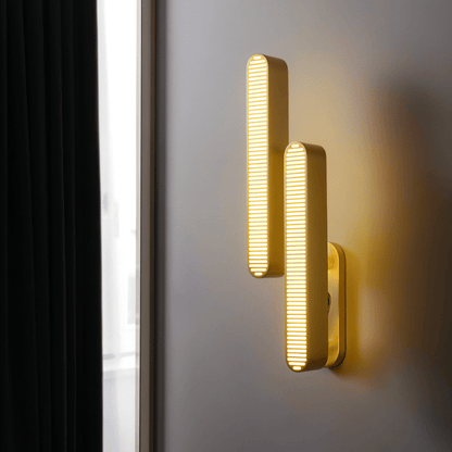 Munira Wall Lamp by Residence Supply featuring a sleek, modern design with a curved metal arm and a round fabric shade.