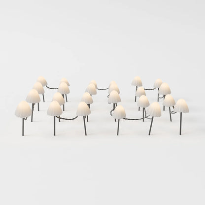 Mycena outdoor garden lamp by Residence Supply displaying a sleek, modern design with warm lighting for outdoor spaces