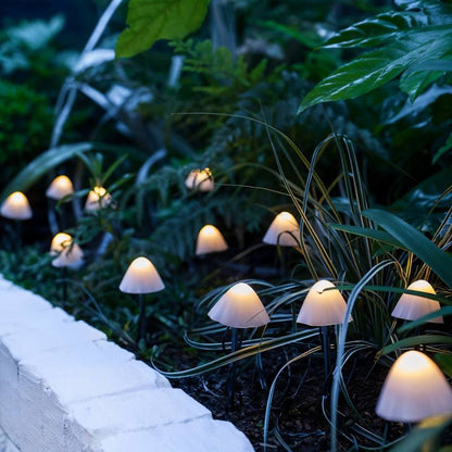 Mycena Outdoor Garden Lamp by Residence Supply illuminating a garden space with warm LED light and weather-resistant design.