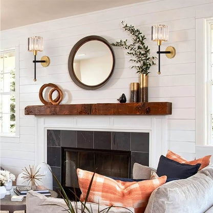 Nagis Wireless Wall Lamp by Residence Supply mounted on a wall with a modern design and sleek metal finish.