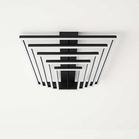 Naia ceiling light by Residence Supply featuring a modern design with a sleek metallic finish and integrated LED lighting.
