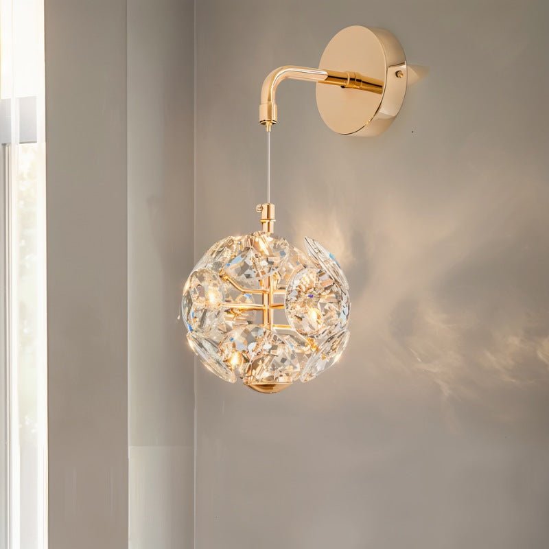 Naqi Crystal Wall Lamp by Residence Supply featuring elegant crystal accents and a sleek metal frame for stylish lighting.