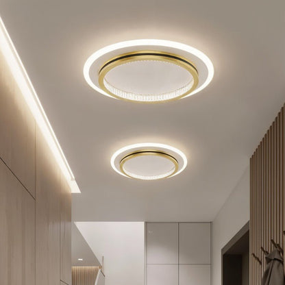 Modern Nar ceiling light by Residence Supply with sleek design and warm illumination, mounted on a ceiling in a contemporary space.