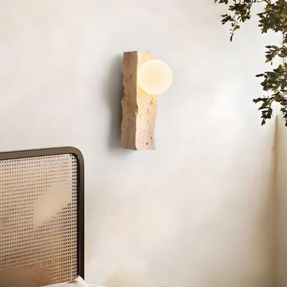 Narvi Wall Lamp by Residence Supply mounted in a bedroom setting, featuring a sleek, modern design with warm lighting.