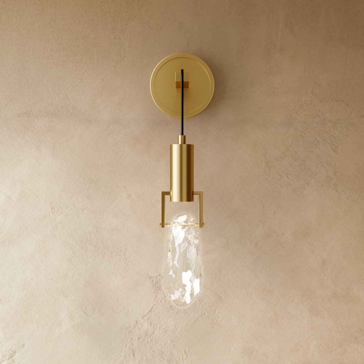 Natalia wall lamp by Residence Supply mounted on a wall with a sleek, modern design and warm lighting.