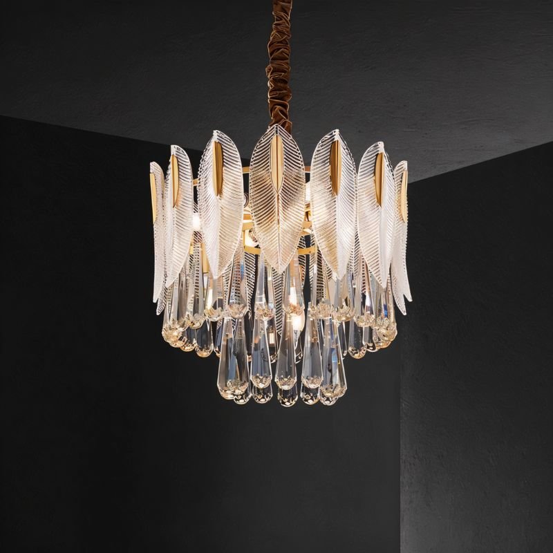 Nehora round crystal chandelier with multiple hanging crystals and a polished metal frame, designed for elegant interior lighting.