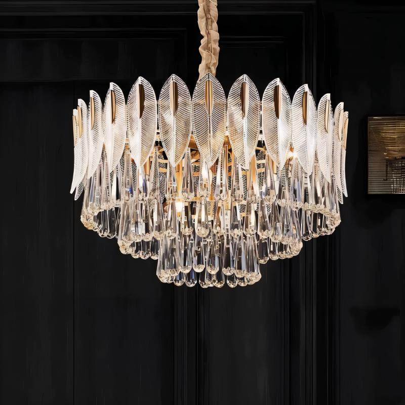 Nehora Round Crystal Chandelier with cascading clear crystals and a polished metal frame, elegant ceiling lighting fixture.