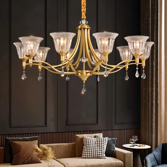 Elegant Nestor Chandelier by Residence Supply hanging in a stylish living room with crystal accents and warm lighting.