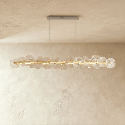 Nexorva chandelier by Residence Supply featuring a modern design with multiple hanging glass bulbs and a sleek metal frame.
