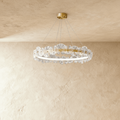 Elegant Nexorva chandelier with multiple glass orbs and a brushed metal finish, hanging from a ceiling fixture.