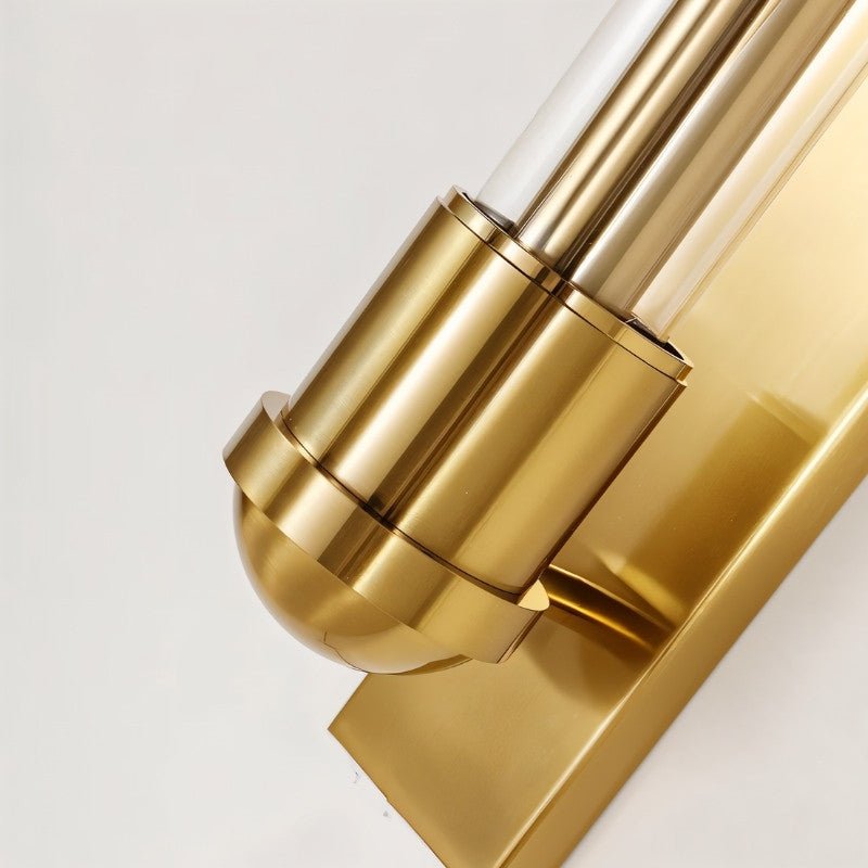 Close-up of the Nexovia Wall Lamp by Residence Supply, showcasing its brass finish and glass detail.