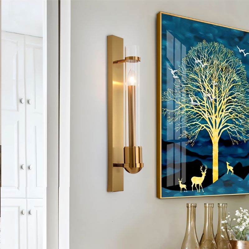 Modern brass Nexovia Wall Lamp with glass shade, ideal for living room decor, by Residence Supply.