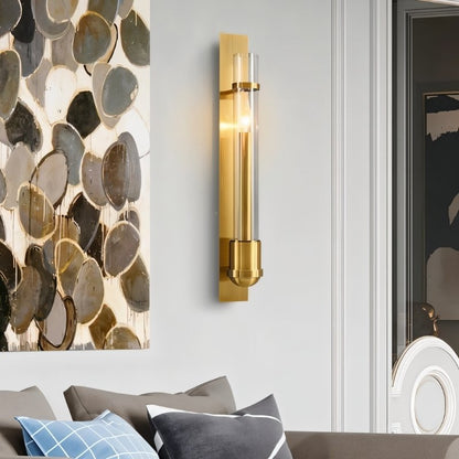 Modern brass and glass Nexovia Wall Lamp by Residence Supply, stylishly illuminating a living room.