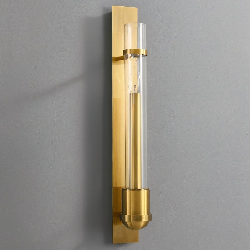 Modern brass wall lamp with glass shade by Residence Supply, designed for stylish indoor lighting.