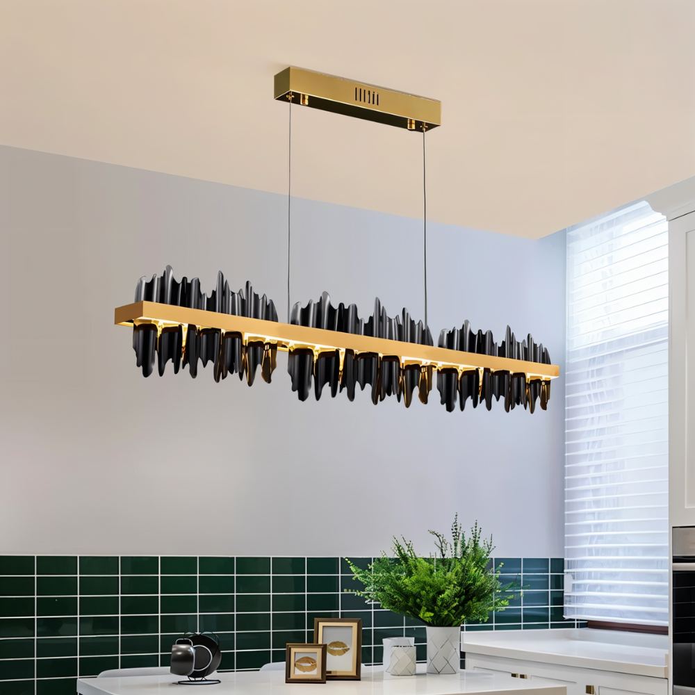 Ninda Linear Chandelier by Residence Supply featuring sleek modern design with multiple hanging light bulbs and a metal frame.