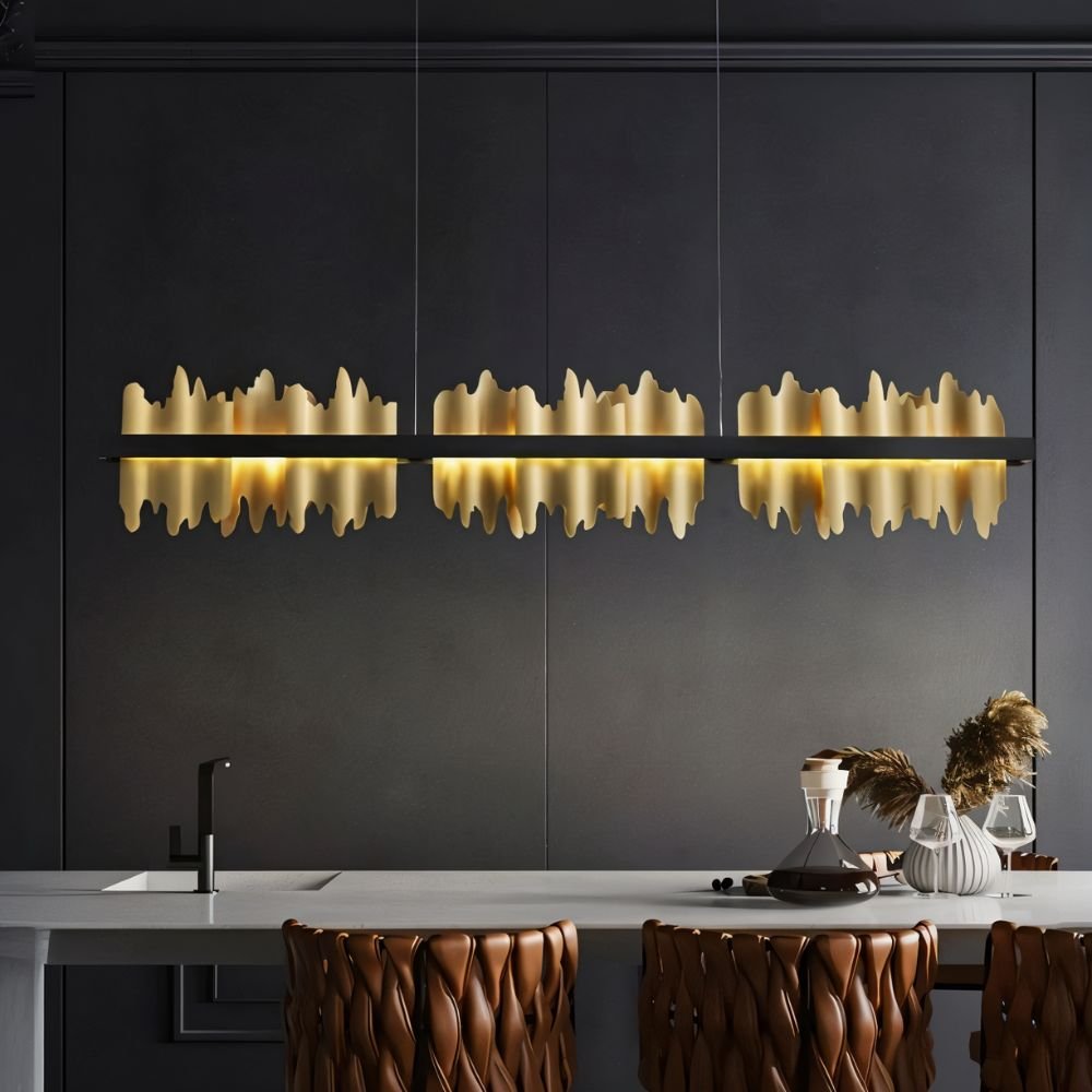 Modern Ninda Linear Chandelier by Residence Supply with sleek metal frame and multiple hanging light bulbs for contemporary decor.