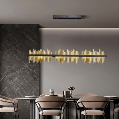 Modern Ninda Linear Chandelier by Residence Supply featuring sleek metal frame and multiple hanging light bulbs for contemporary decor.