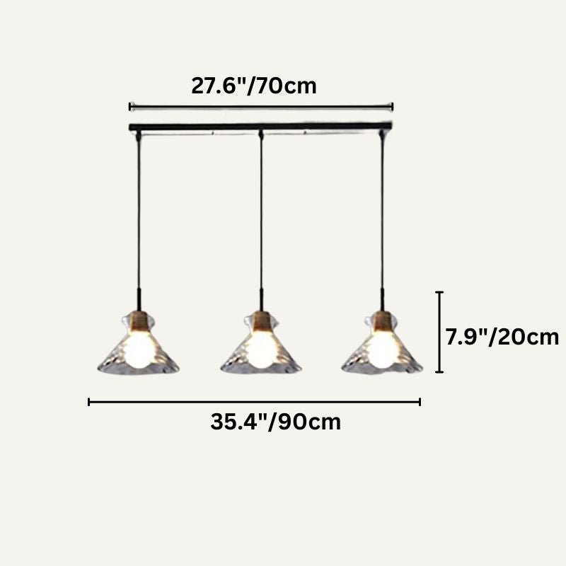 Nivkah pendant light by Residence Supply featuring a sleek modern design with a metal finish and a hanging cord.