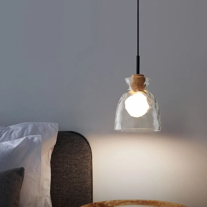 Nivkah pendant light by Residence Supply featuring a sleek modern design with a metallic finish and adjustable hanging cords.