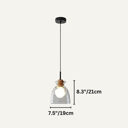 Modern Nivkah Pendant Light by Residence Supply with a sleek design and metallic finish hanging from a ceiling mount.