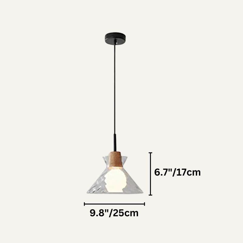 Nivkah pendant light by Residence Supply with a sleek modern design and metallic finish, hanging from a ceiling fixture.