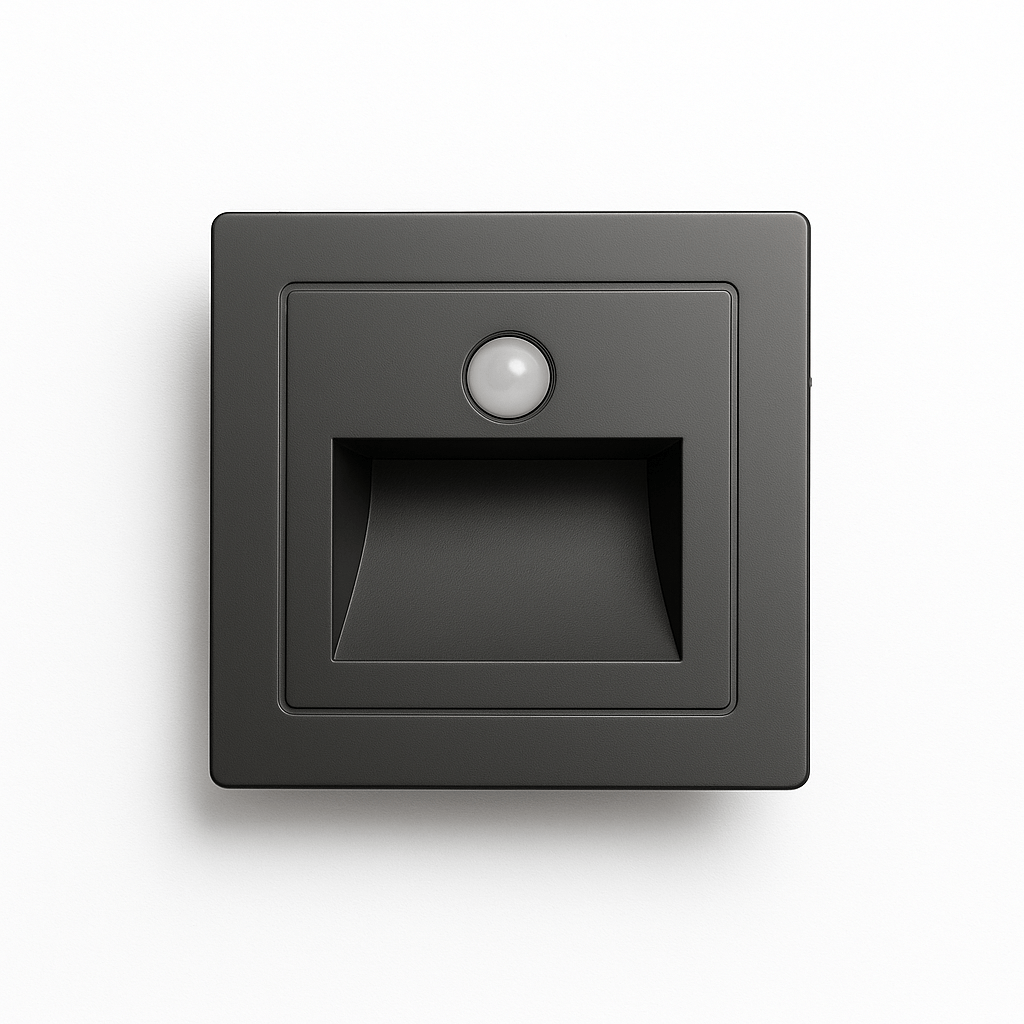 Noa Stair Light by Residence Supply mounted on a staircase wall, providing subtle LED illumination for safe navigation.