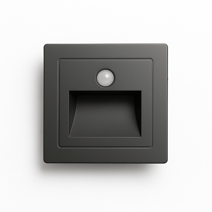 Noa Stair Light by Residence Supply mounted on a staircase wall, providing subtle LED illumination for safe navigation.