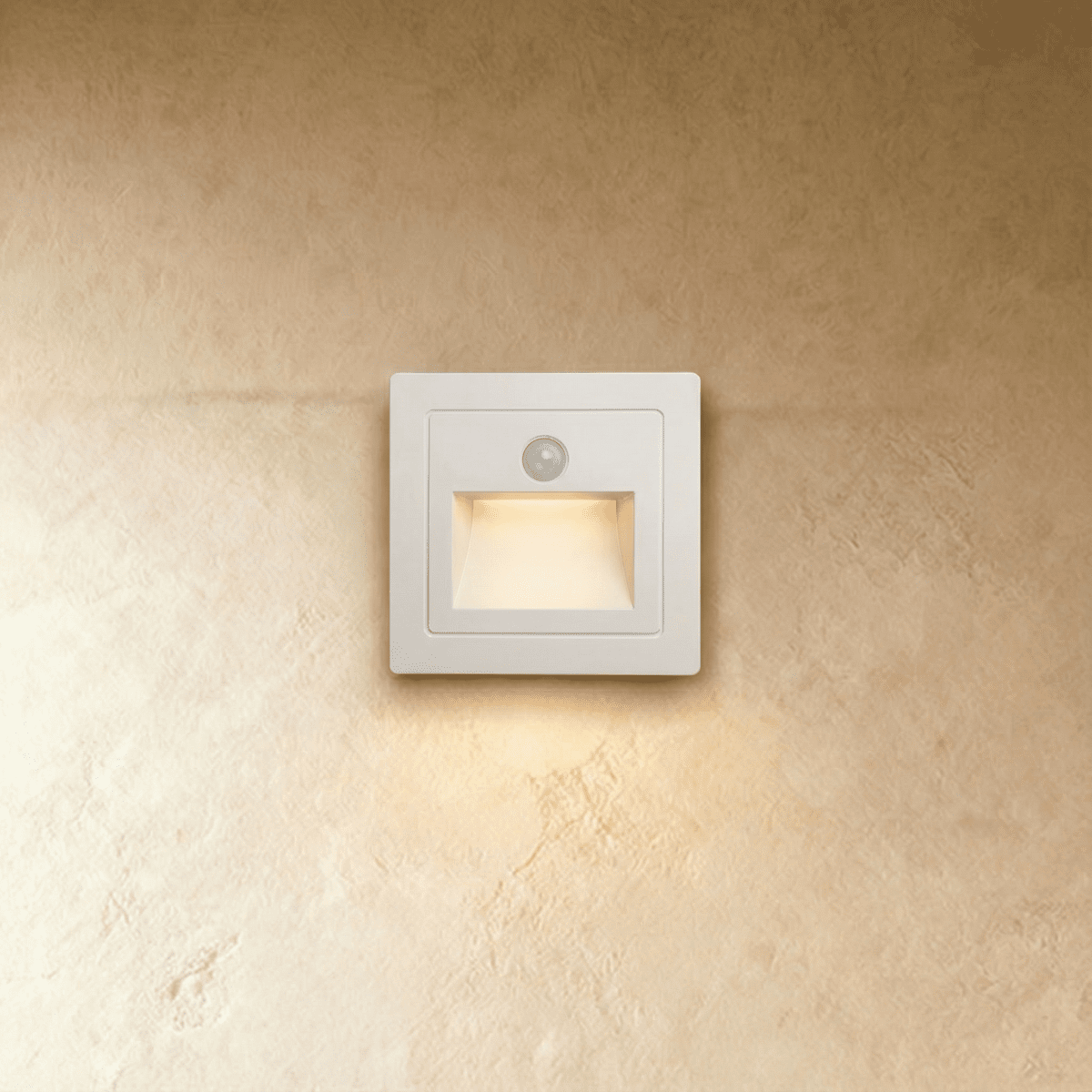 Residence Supply Noa Stair Light mounted on a staircase wall, featuring sleek modern design with integrated LED lighting.