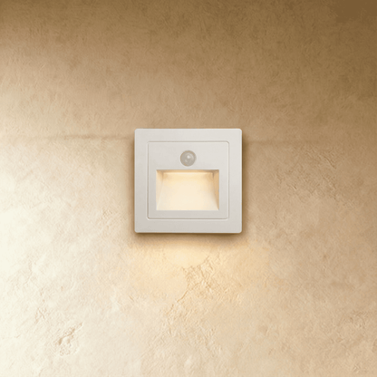 Residence Supply Noa Stair Light mounted on a staircase wall, featuring sleek modern design with integrated LED lighting.