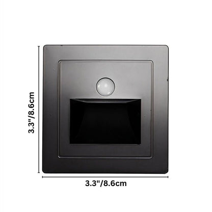 Noa Stair Light from Residence Supply mounted on a staircase wall, providing ambient illumination for safety and style.