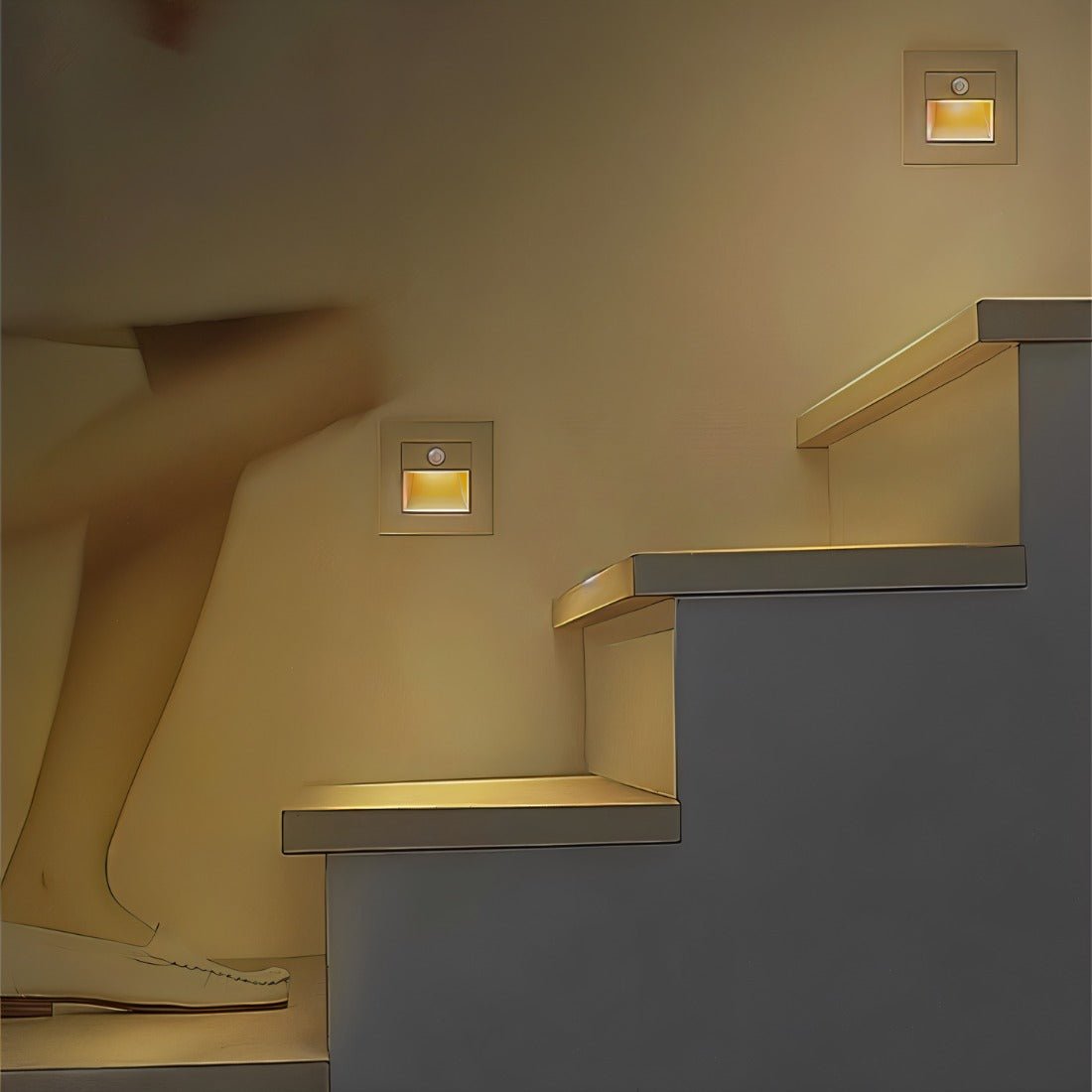 Noa Stair Light by Residence Supply illuminating a staircase with sleek, modern design and soft LED lighting.