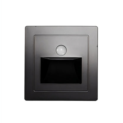 Noa Stair Light by Residence Supply mounted on a staircase wall, providing subtle, modern illumination for safety and style.