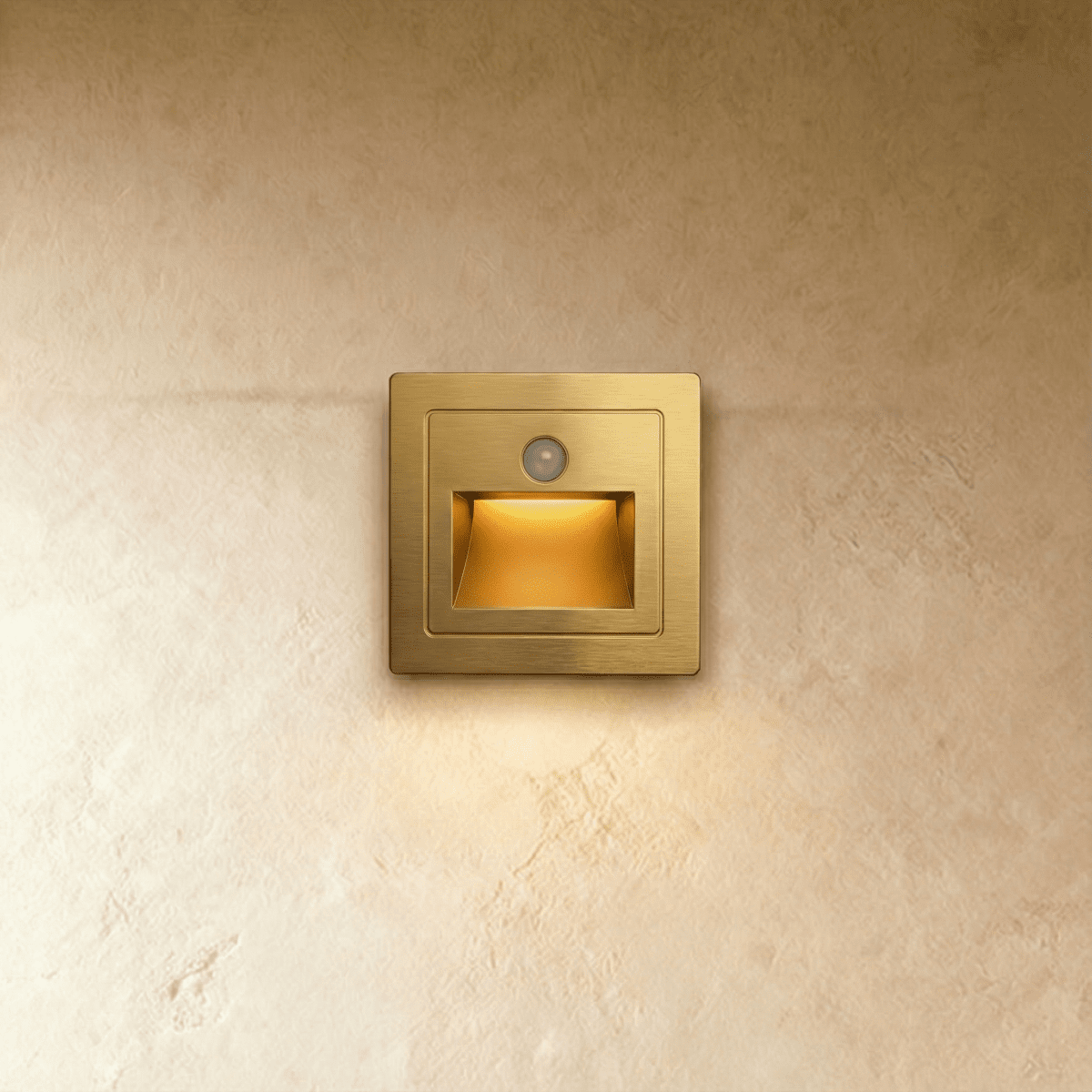 Noa Stair Light by Residence Supply mounted on a staircase wall, featuring a sleek modern design for subtle illumination