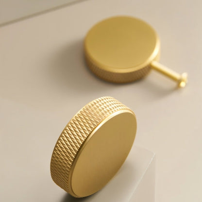 Close-up of Residence Supply Noah Knob, a cylindrical knurled cabinet hardware knob for home and garden furniture.