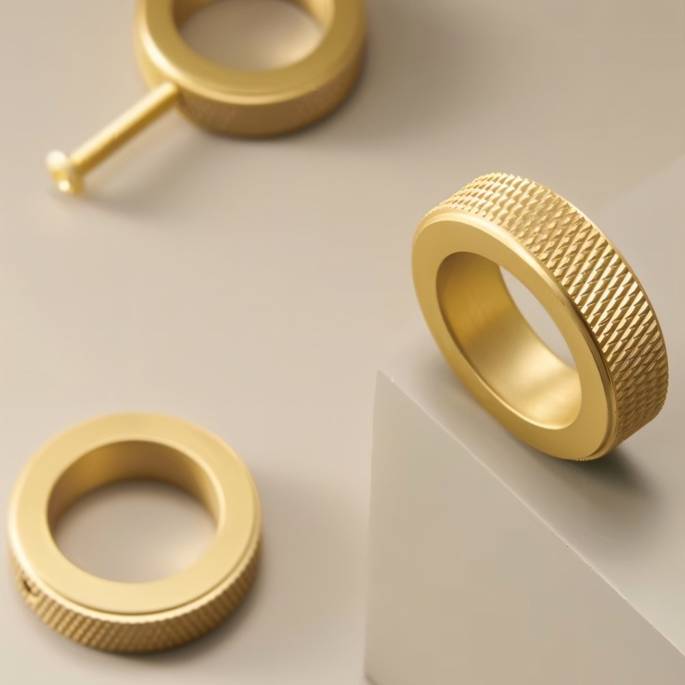 Close-up of Residence Supply Noah Knob, cylindrical knurled modern cabinet hardware for home and garden furniture.