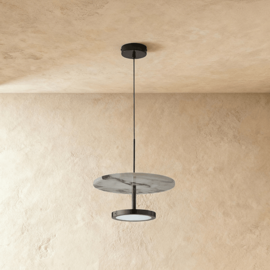 Residence Supply Noctra Pendant Light hanging fixture with sleek modern design and metal finish.