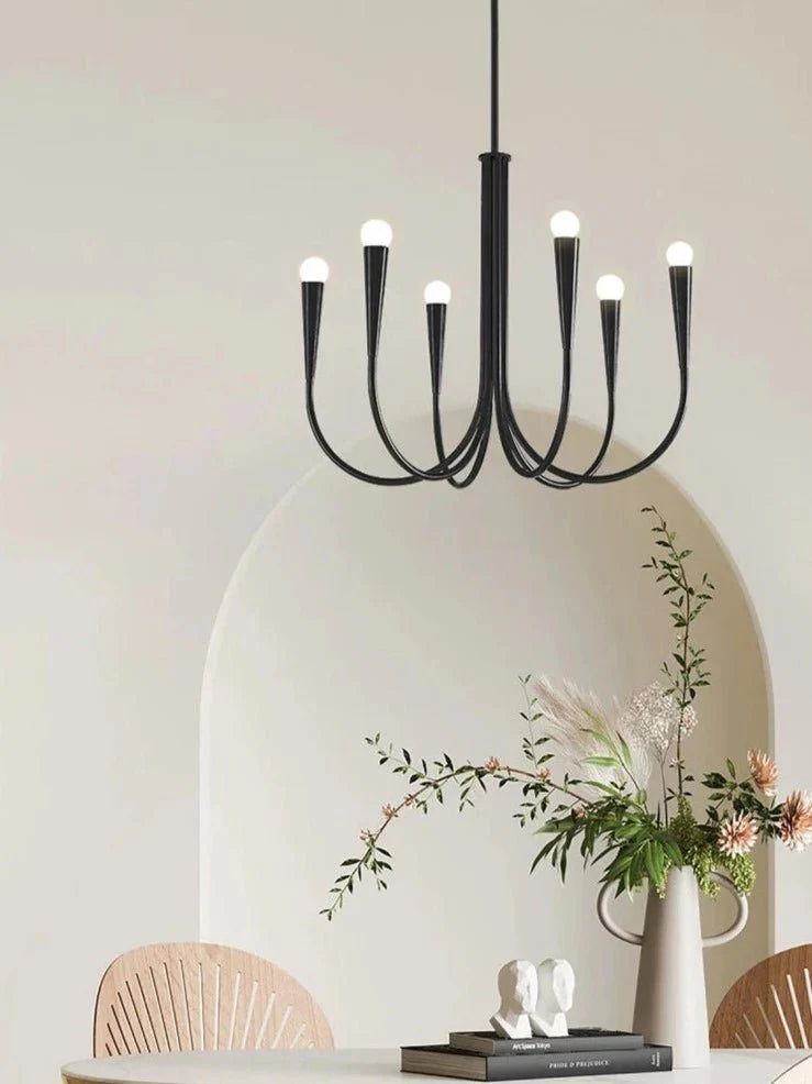 Elegant Noelle chandelier by Residence Supply featuring intricate crystal details and a classic metal frame.